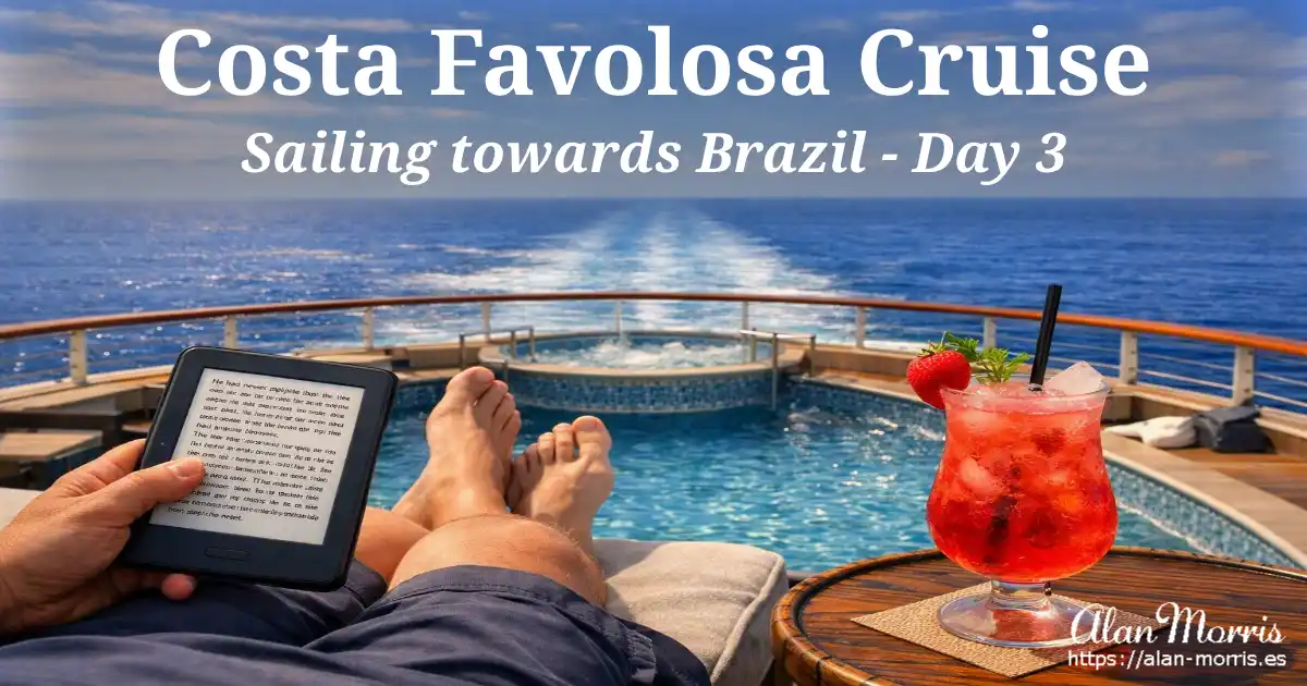 Legs by aft pool, Kindle showing English text, strawberry cocktail, ocean wake in bright sun.