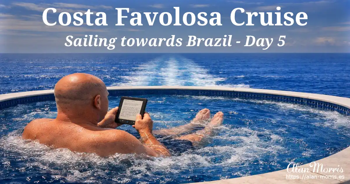 Alan Morris relaxing alone in bubbling infinity jacuzzi at ship’s stern, reading Kindle, deep blue ocean and wake.