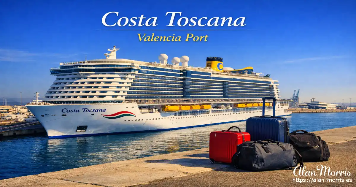 Costa Toscana cruise ship docked at Valencia port with luggage on the quay under a clear blue sky.