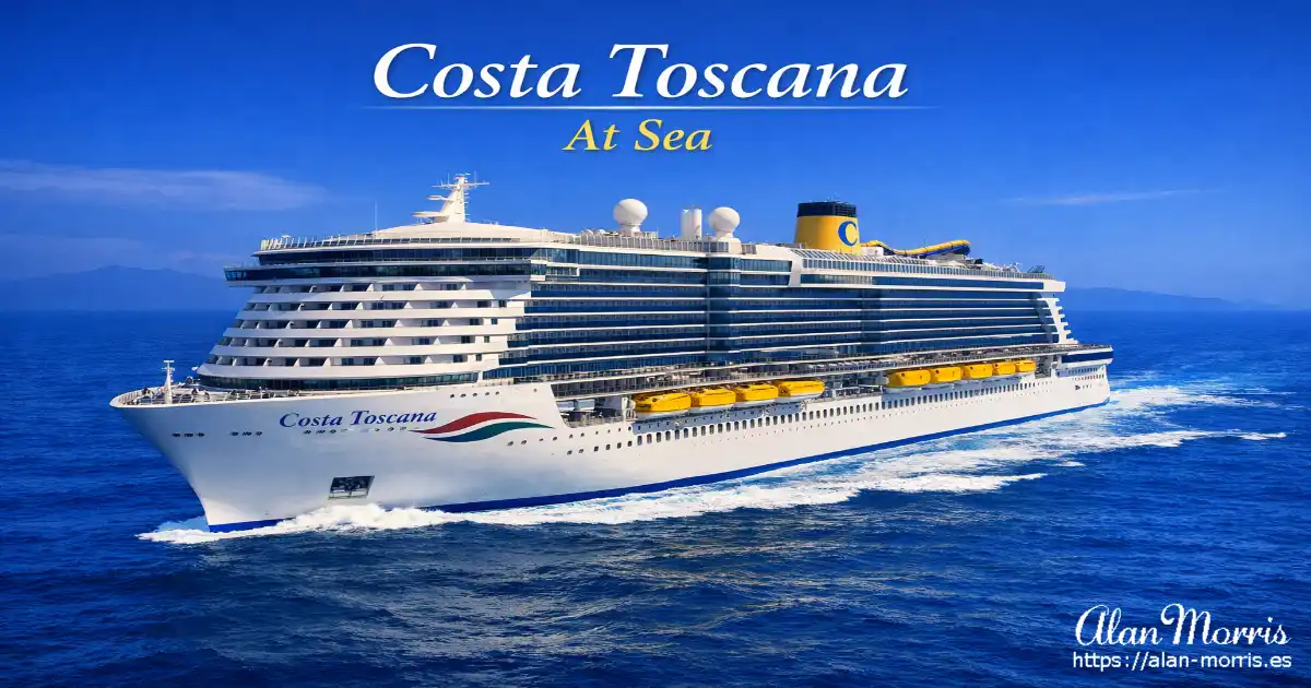 Costa Toscana cruise ship sailing through deep Mediterranean blue waters under a clear sky.