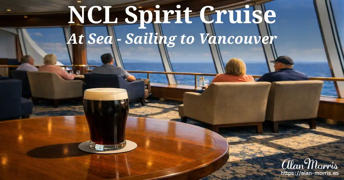 Beer glass in a cruise lounge overlooking the ocean.