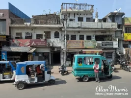 Tuk Tuk and a somewhat squat little taxi on a street in Lucknow. Tuk Tuk and a somewhat squat little taxi on a street in Lucknow.