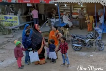 Indian family chatting along the roadside.