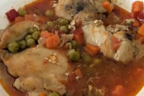 Fish in tomato salsa with vegetables.